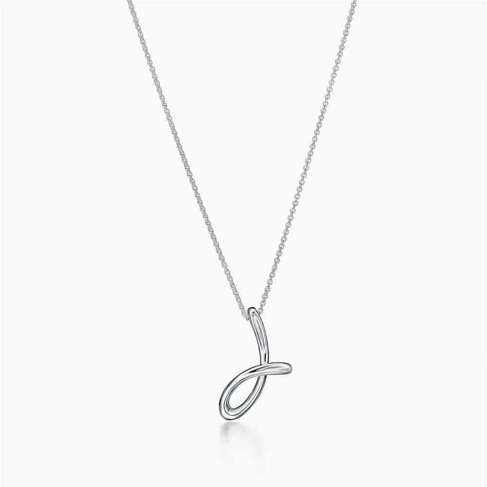 Tiffany & Co. Elsa Peretti “J” pendant in sterling silver